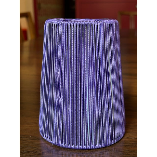 Set of 4 small string shades made from purple string with white lining, with a candle clip. Top: 3" across Bottom: 4"...