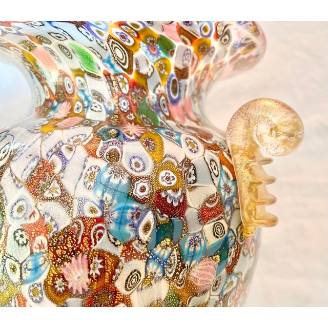 Vintage millefiori Murano glass vase. Handmade. Bought in Italy. Features a multicolor design with gold leaf accents...