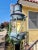 An antique Anchor ship lantern converted into a lamp post. An amazing and unique nautical find to add to any beach house...