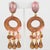 These stunning oversized clip-on earrings by Dominique Denaive Paris boast a sculptural chandelier dangling shape with...