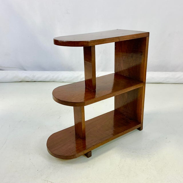 We see these Americana Folk Art 3-Tier Side Tables frequently which leads us to wonder if they were high school shop class...