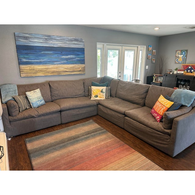 Authentic Restoration Hardware Cloud Slope Arm Modular Sectional upholstered in a soft gray linen blend. This highly...