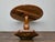 This early 19th-century Austrian Biedermeier center table presents an elegant balance of architectural restraint and rich...