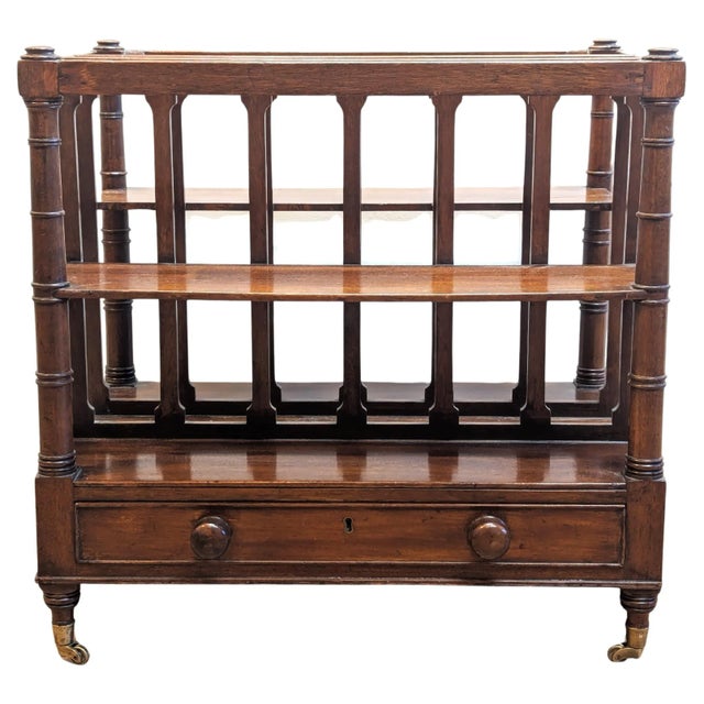 19th Century English Canterbury Magazine Book Rack. Very nice antique Canterbury on brass casters with four shelfs and...
