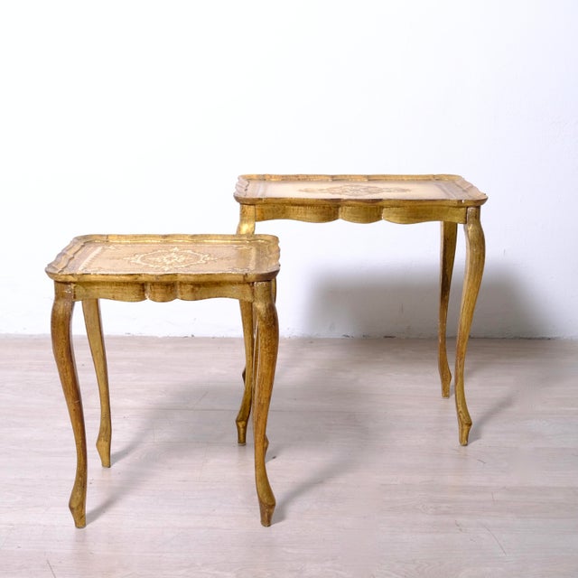 Beautiful set of two nesting tables, in Florentine style, Italy 1960s. Dimensions: 1st table; height 58 cm width 56 cm...