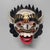 An expressive Balinese mask, hand-carved and painted. Dimensions: height 27 cm, width 27 cm, depth 16 cm. The large round...