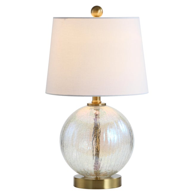 Master glass artisans inspired this contemporary table lamp. Designed to highlight it's deluxe materials, it’s crafted...