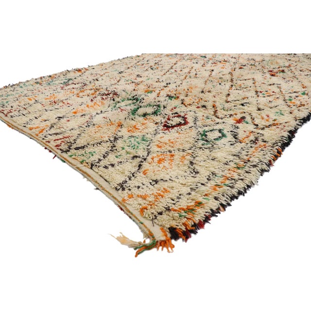 Vintage Berber Beni Ourain Moroccan Rug with Tribal Style 06'00 x 10'10. With its simplicity, plush pile and tribal style,...