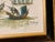 This stunning piece showcases the refined artistry of P. Wong, beautifully matted and framed over linen and velvet. The...