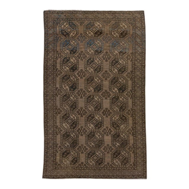 1930s Antique Turkmen Handmade Wool Brown Rug With Gul Design For Sale