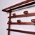 Dark-stained wood wall-mounted coat rack designed by Carlo Enrico Longhi for Elam in the 1960s and 1970s. An iconic piece...