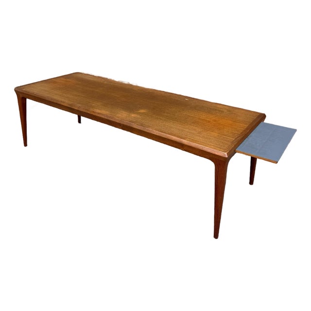 Mid 20th Century Attributed to Johannes Andersen Teak Danish Modern Coffee Table With Pull-Out Laminate Shelf For Sale