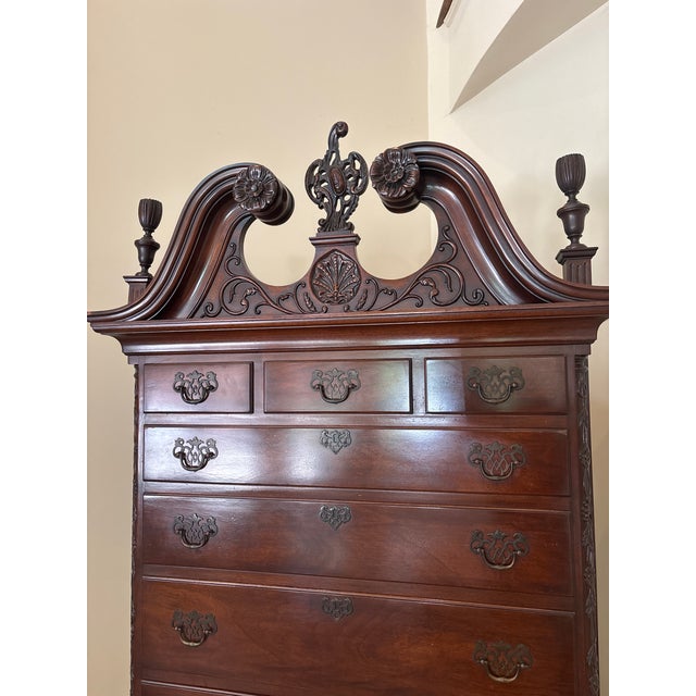 A striking tall mahogany chest from Tomlinson of High Point’s iconic “Williamsburg Galleries“ collection- One of the...