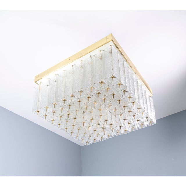 A striking bohemian flush-mount ceiling light from the 1960s, originally produced in prague. This rare piece is defined by...