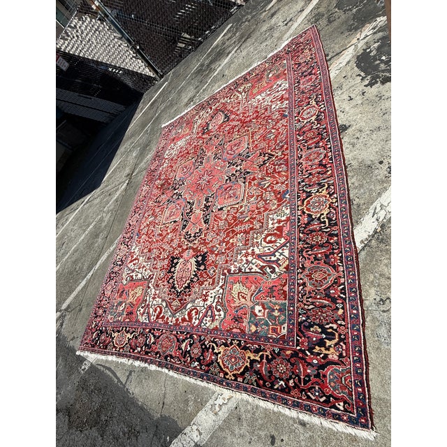 Design Plus Gallery presents a 9ft 4in × 12ft 4in 1930's Jewel Tone Area Rug from the Hariz Region of Iran. This area rug...