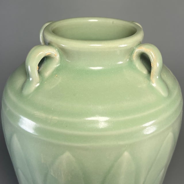 Fine antique Chinese celadon four‑handle vase. Beautiful carved lotus‑petal relief decoration on the body, smooth soft...