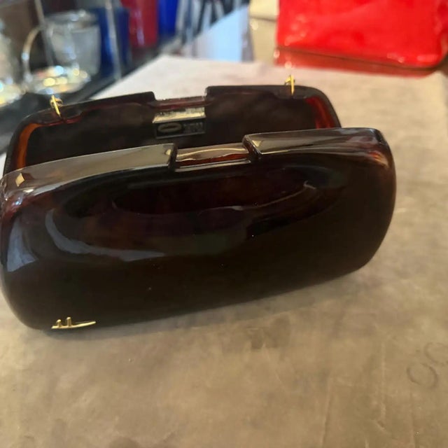 This stunning piece is a beautiful example of Art Deco and post-war design, showcasing the sophisticated use of Bakelite...