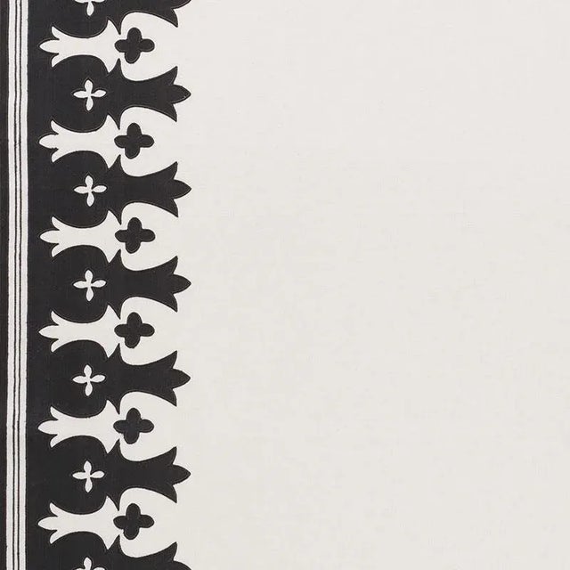 This large-scale appliqué derives from an antique panel. The pattern runs along the edges of a solid linen ground, so it...