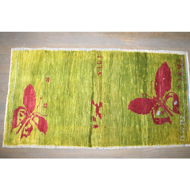 Late 20th Century Green Turkish Anatolian Butterfly Rug dated 1975 rug no. j4972 For Sale - Image 5 of 7