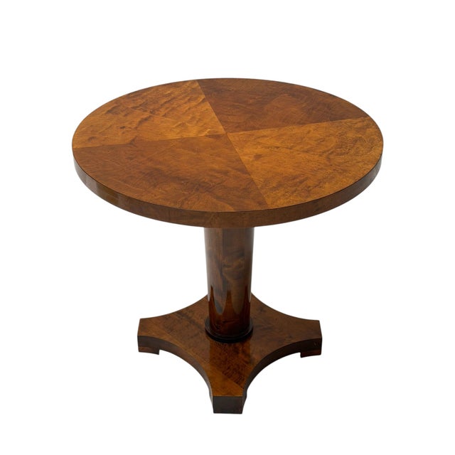 Stunning and elegant round Art Deco side table. Striking Swedish design from the 1930s. Original walnut veneered base with...