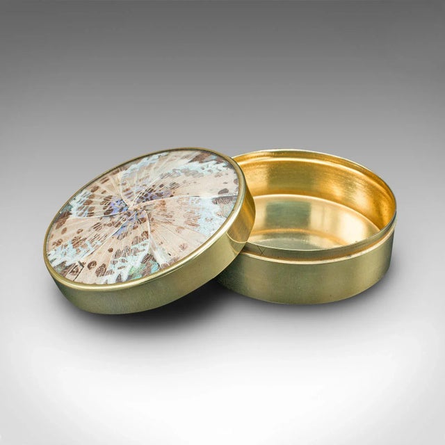 This is a vintage sugared treats dish. A French, brass and glass small pot with butterfly wing decor, dating to the early...