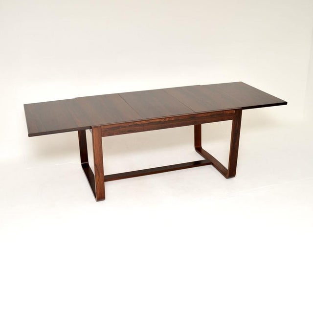 A beautiful and very stylish vintage dining table by Uniflex. This was designed by Gunther Hoffstead, it was made in...