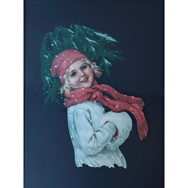 Delightful framed winter print of young girl in a cozy scarf and coat among snowflakes and evergreen branches. Most items...