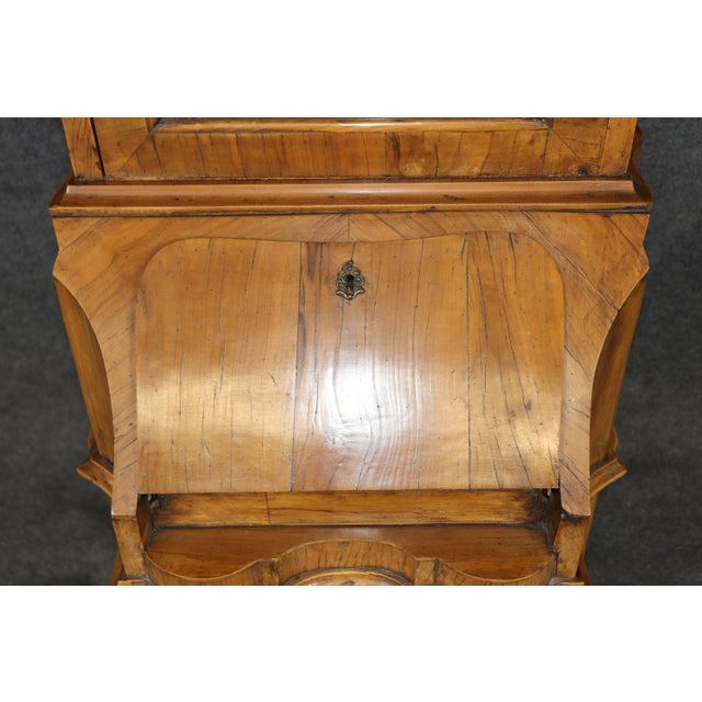 This exceptional Italian Rococo secretary desk is a masterful expression of eighteenth-century Italian craftsmanship,...