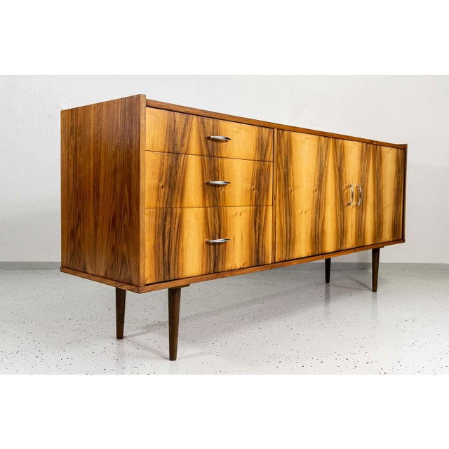 Sideboard designed by Marian Grabiński, manufactured by Spółdzielnia Stolarzy Czarnków, Poland, 1960s. Walnut veneered...