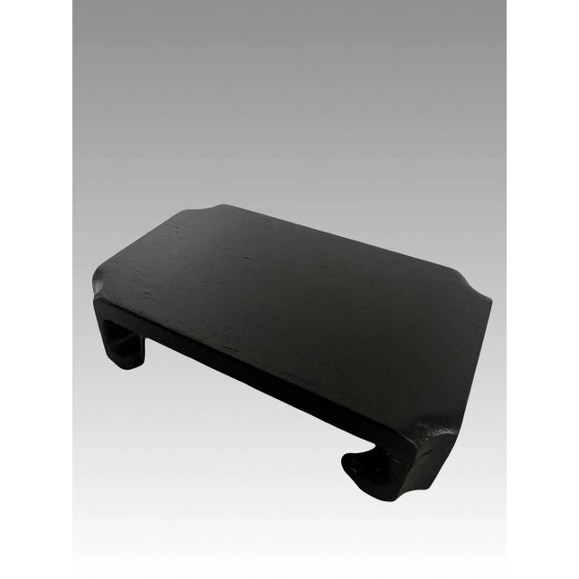 A rectangular dark brown solid wood stand for displaying a vase, carvings, statues or any of your treasures. Flat top that...