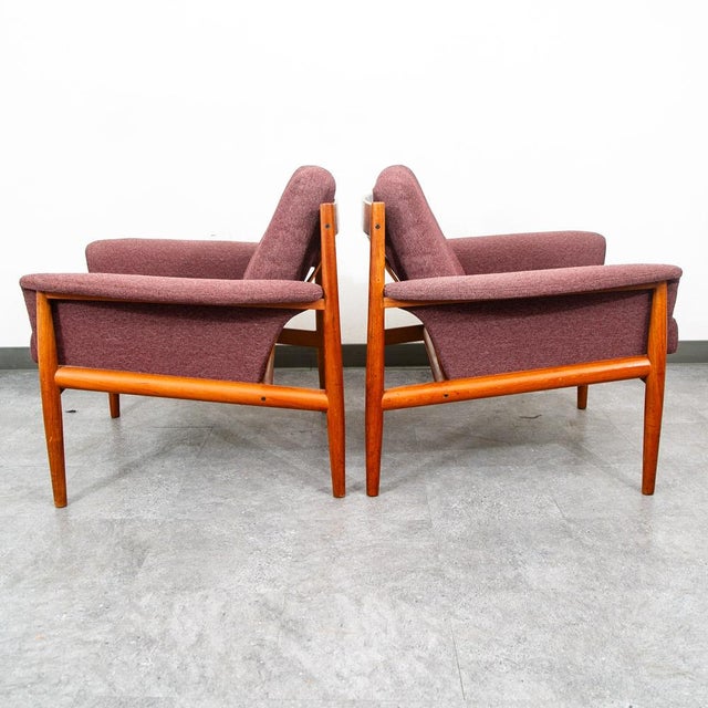 A rare sculptural Lounge chair set Model #168 designed by Grete Jalk For France & Son, circa 1960s. The solid teak frames...