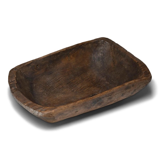 This large wooden farm tray from perfectly balances rustic texture with minimalist simplicity. Carved from a solid block...