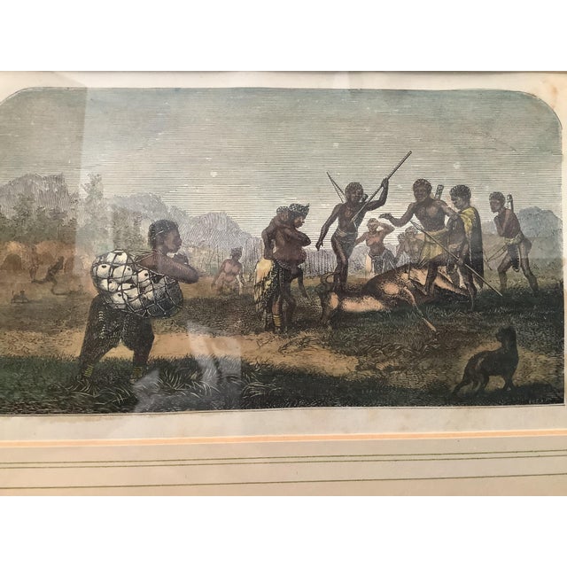 From a relatives travels in Cape Town, this lithograph print featuring an indigenous tribe capturing their hunt. This art...