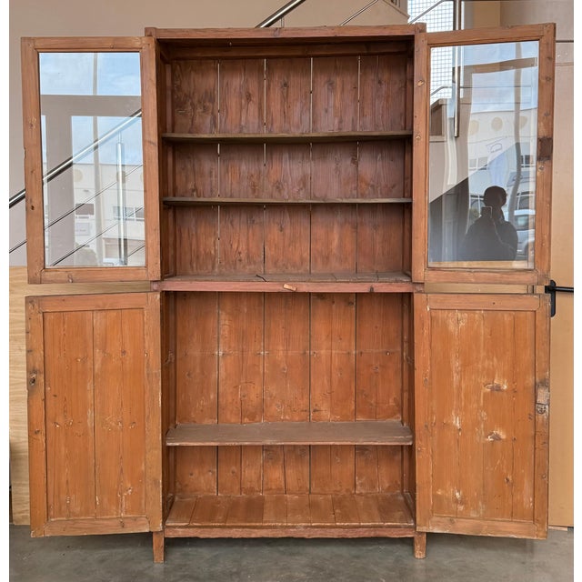 19th Century Spanish cupboard or bookcase with glass vitrine, constructed from a pine called "mobila" and original glasses...