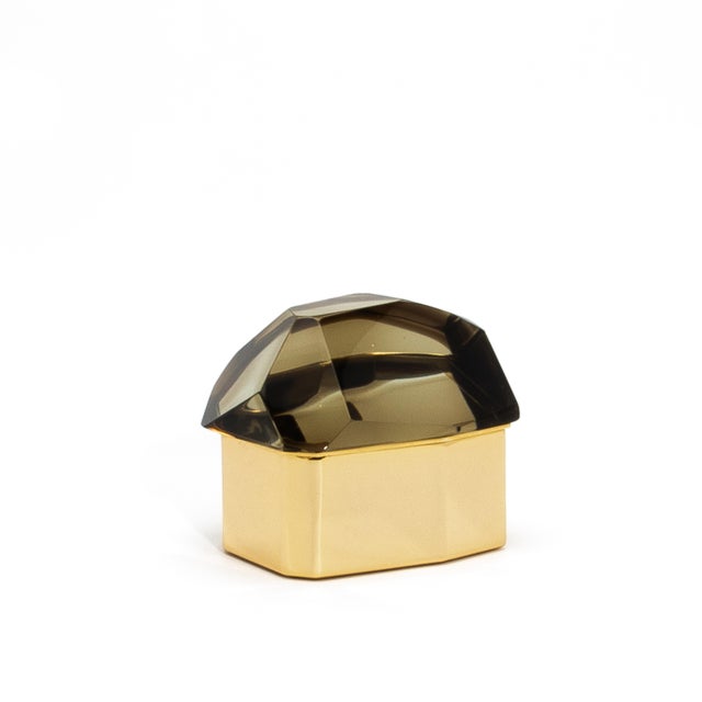 This Murano glass rock box is a striking fusion of sculptural artistry and functional elegance. The faceted smoky topaz...