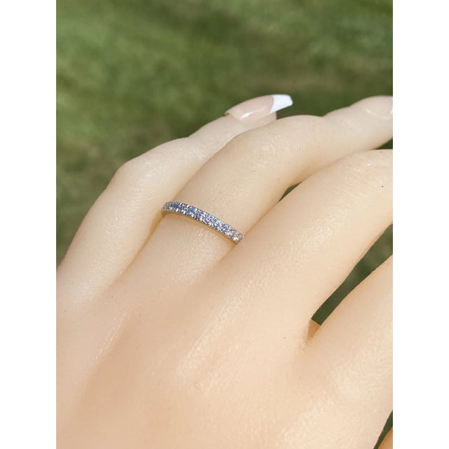 The Soleste: Tiffany and Company Soleste Half Eternity Band in Platinum. The band features 0.17 carats of French set round...