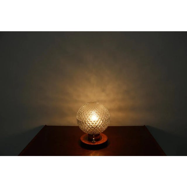 - Made in Czechoslovakia - Made of brass, glass - Re-polished - Fully functional, - 1960. This piece is attributed to the...