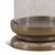 Beautiful large candle holder with antiqued brass finish aluminum base and glass surround. Each may vary in patina and...