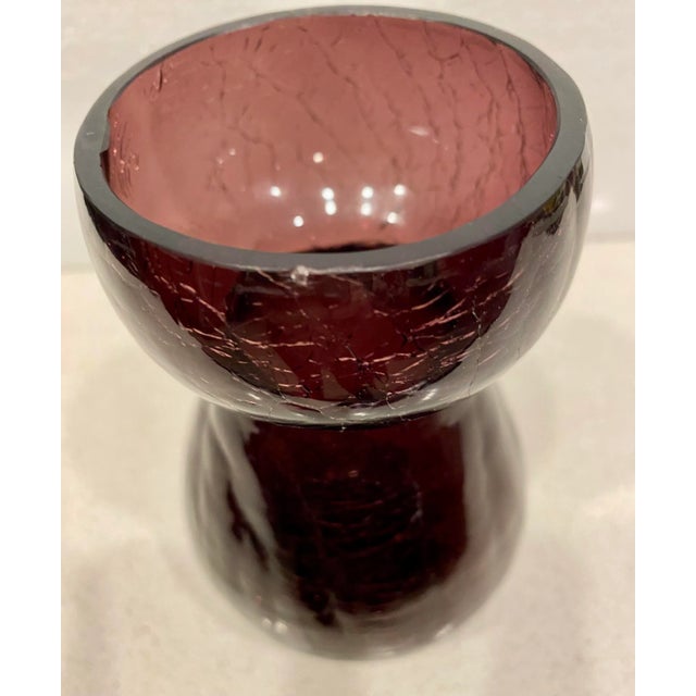Stunning hand made crackle glass hyacinth vase presented in a rich amethyst color. This is a heavy weight glass vessel...
