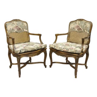 Vintage French Country Louis XV Style Upholstered Cane Lounge Arm Chairs - Pair For Sale