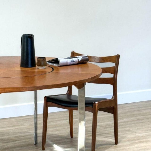A beautiful 1960s dining table designed by Richard Young and handcrafted in England by Merrow Associates , one of the most...