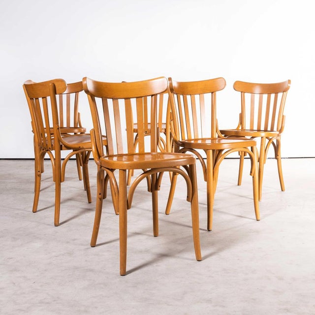 1970’s Bentwood Honey Beech Striped Seat Bentwood Dining Chairs – Set Of Six. Sourced in France these are late production...