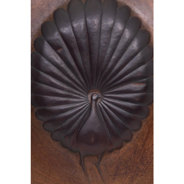 Crafted from a single plate of copper, this 3D relief of a Peacock . signed Kapingca Zambia, Africa at the time, back in...