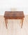 A handsome Italian Directoire game table dating to circa 1800, beautifully veneered in richly figured walnut burl, prized...