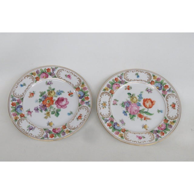 This stunning Set of 2 Plates are made out of porcelain. These gorgeous matching plates are marked on the bottom as...