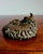 A masterclass in the naturalistic philosophy of Japan's Meiji period (1868–1912), this exquisite cast-bronze paperweight...