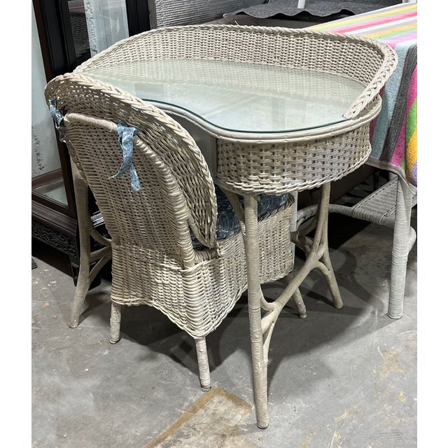 Antique wicker vanity table/ writing desk and chair made by Oriole Reed Furniture, a division of Withrow Manufacturing....