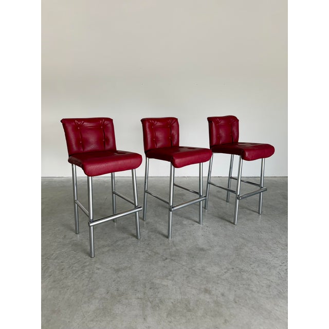 Set of 3 bar height Mid Century Modern tall Chrome and Burgundy Vinyl high back barstools, attributed to Cal-Style...