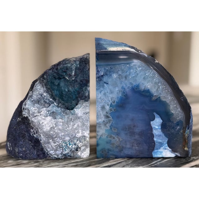Presenting a pair of blue agate bookends from Brazil. Made in nature, so no two are alike. To view our over 400 unique,...