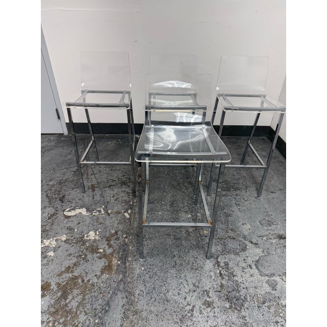 Design Plus Gallery presents a Set of Four Vapor Bar Stools by CB2. Each stool has a single molded panel of clear acrylic...